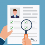 Cartoon-style image of two hands viewing a resume. One of the hands is holding a magnifying glass over the resume.